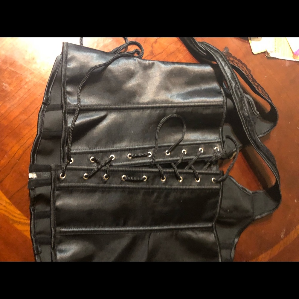 New corset that ties at neck.